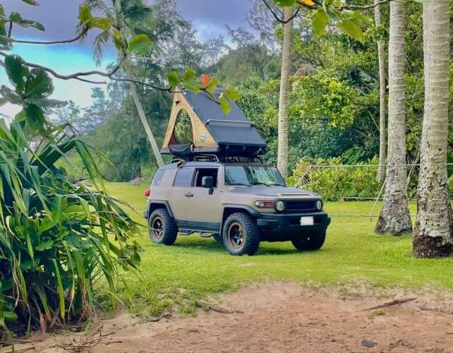 camper with rooftop tent