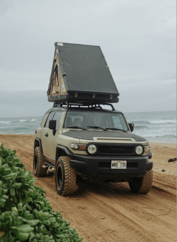 jeep with rooftop camp