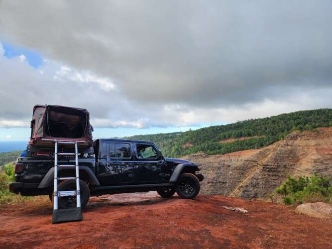 black gladiator with rooftop camping tent