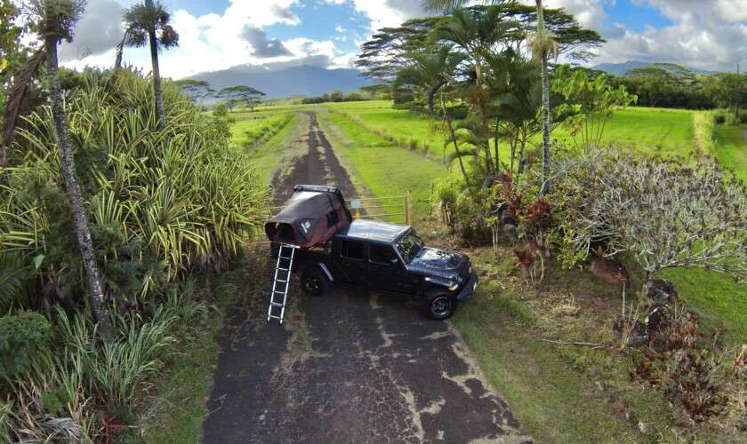 jeep with camping tent at the top